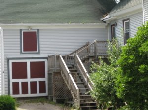 The "barn door" and steps to an inlaw apartment.