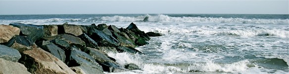 stone jetty in surf